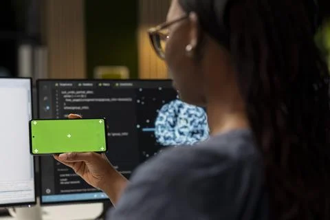 Admin using AI app on isolated screen smartphone to optimize performance 写真素材