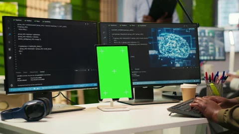 Admin using isolated screen tablet to code AI algorithms debugging software Stock Footage 313164330