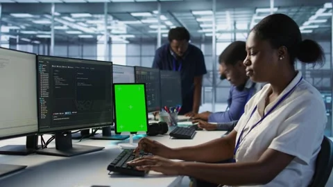 Admin using isolated screen tablet, working in server farm Stock Footage 319551979