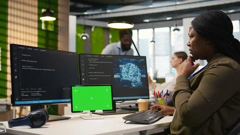 Admin using isolated screen tablet to code AI algorithms debugging software Stock Photos