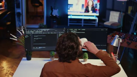 Admin using javascript coding language to fortify IT security Stock Footage 265510173