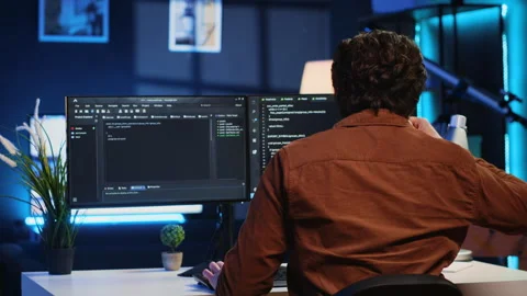 Admin using javascript coding language to fortify IT security Stock Footage 265513073