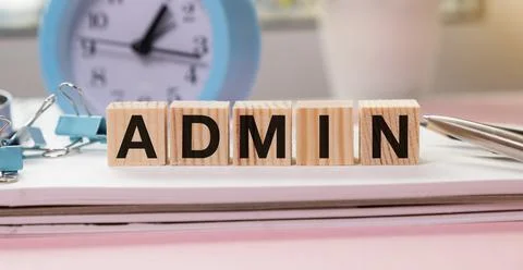 ADMIN word built with letter cubes on a black table Stock Photos