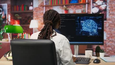 Admin writing artificial intelligence code on computer Stock Photos