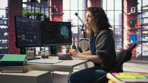 Admin writing code doing maintenance on artificial intelligence neural networks Stock Footage 308671131