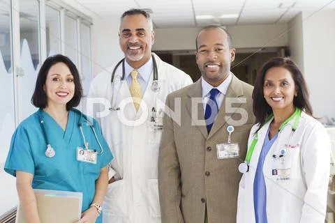 Administrator, doctors and nurse in hospital Stock Photos