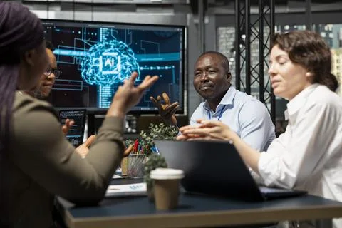 Admins doing brainstorming, developing AI software in startup office 写真素材