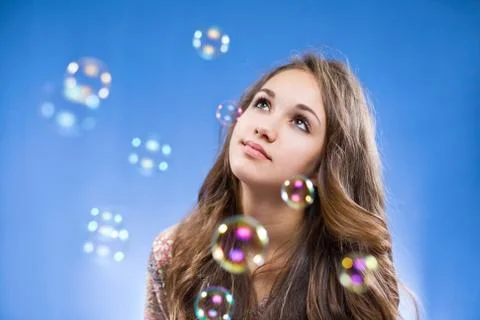 Admiring the bubbles. Stock Photos