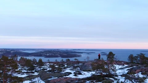 Admiring the view from the top of a rock Stock-Footage 105850189