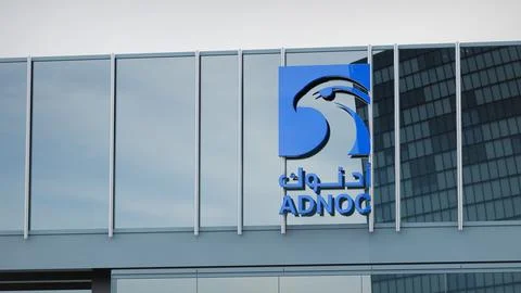 ADNOC Stock data presented on the logo of the office facade editorial Stock Photos