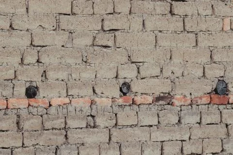 Adobe background, mud bricks, old wall brown Stock Photos