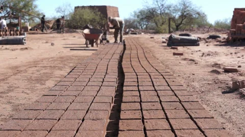 Adobe Brick Making Far Dolly Stock Footage 33338971