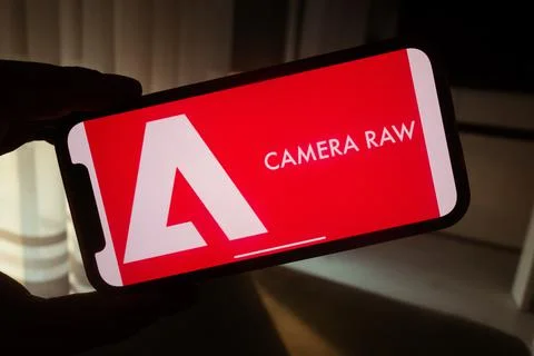 Adobe Camera Raw logo displayed on mobile phone Stock Photos