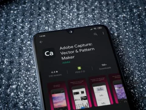 Adobe Capture - Vector and Pattern Maker app play store page on the display o Foto stock
