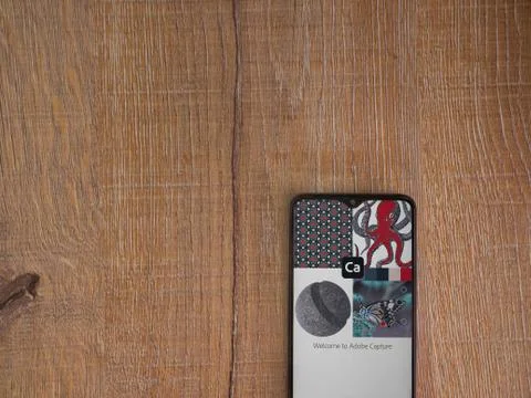 Adobe Capture - Vector and Pattern Maker app launch screen with logo on the d Foto stock