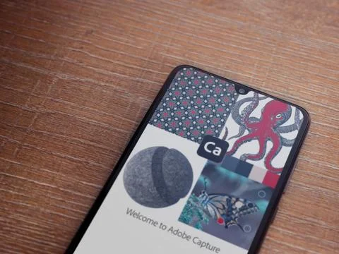 Adobe Capture - Vector and Pattern Maker app launch screen with logo on the d Stock Photos