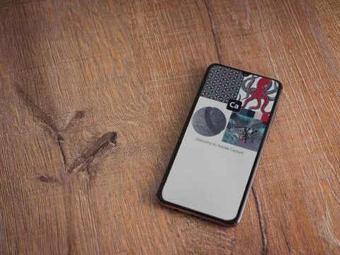 Adobe Capture - Vector and Pattern Maker app launch screen with logo on the d Stock Photos