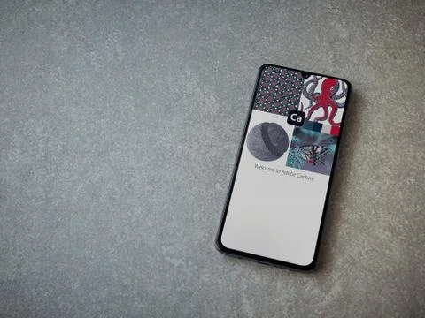 Adobe Capture - Vector and Pattern Maker app launch screen with logo on the d Stock Photos