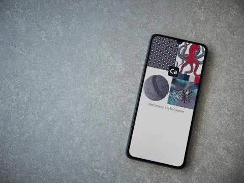 Adobe Capture - Vector and Pattern Maker app launch screen with logo on the d Foto stock