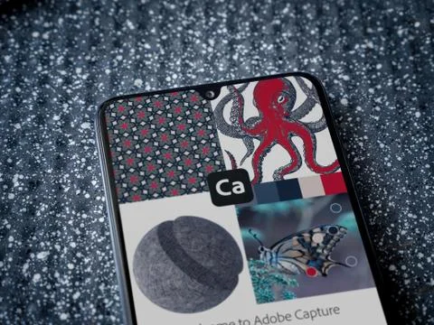 Adobe Capture - Vector and Pattern Maker app launch screen with logo on the d Stock Photos