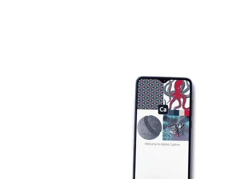 Adobe Capture - Vector &amp; Pattern Maker app launch screen with logo on the dis Stock Photos