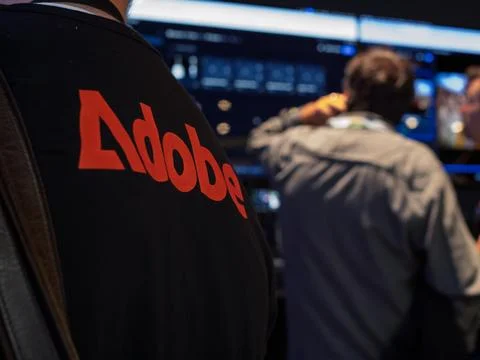 Adobe Conference Attendee Engaging with Creative Software Stock Photos