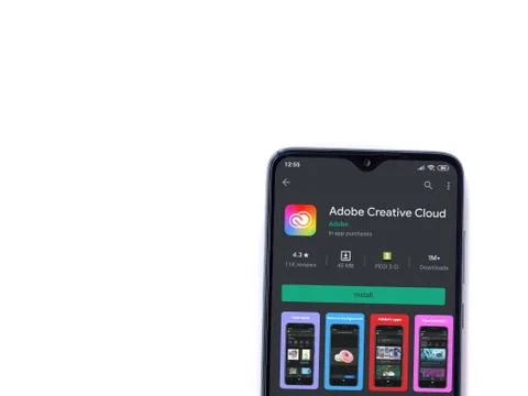 Adobe Creative Cloud app play store page on the display of a black mobile sma Foto stock