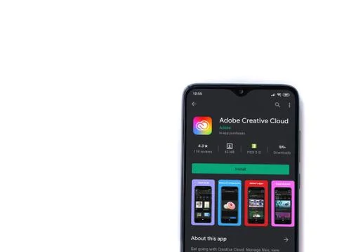 Adobe Creative Cloud app play store page on the display of a black mobile sma Foto stock