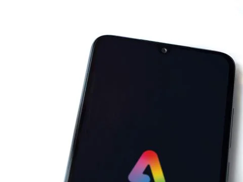 Adobe Express - Graphic Design app launch screen on smartphone on white bac.. Foto stock