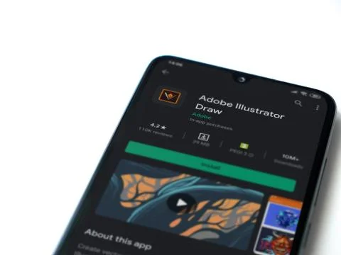 Adobe Illustrator Draw app play store page on the display of a black mobile s Stock Photos