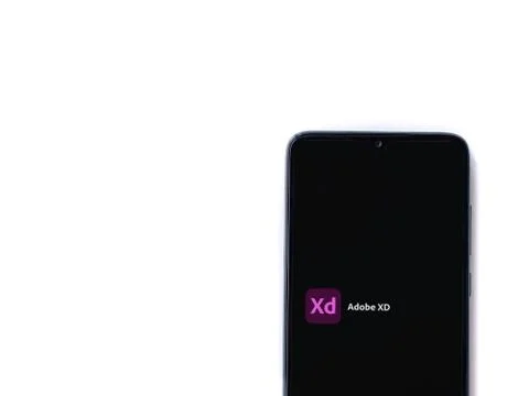 Adobe XD app launch screen with logo on the display of a black mobile smartph Stock-Fotos