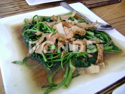 Adobong kangkong with chicharon- Filipino favorite Stock Photos