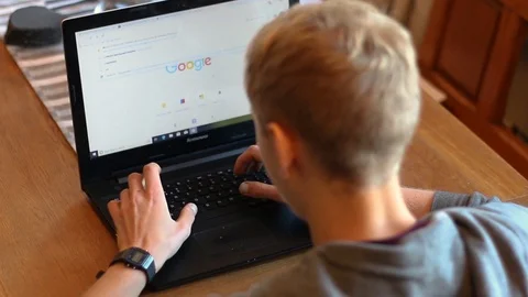 Adolescent Male Using Search Engine Stock Footage 98090423