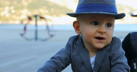 Adorable Baby Boy With Hat And Suit Jacket Stock-Footage 97096853