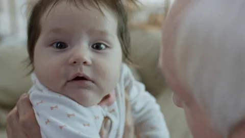 Adorable Baby Looking at Camera Stock-Footage 89742946