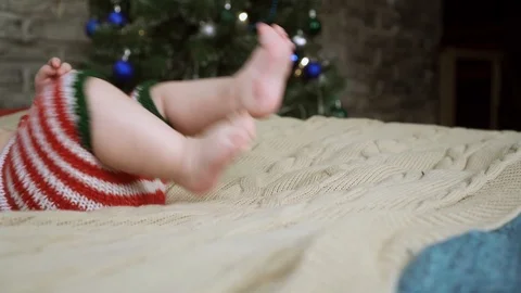 Adorable baby lying on back on bed and smiling Stock Footage 86520880