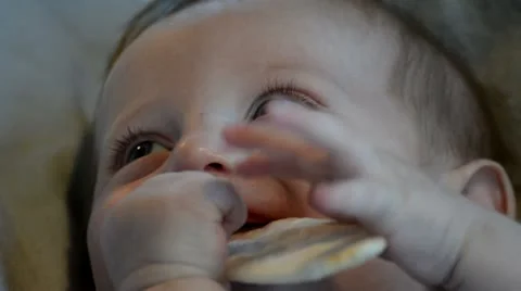 Adorable baby teething cracker Vídeo Stock 11425152