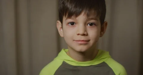 Adorable boy smiling at the camera Stock Footage 104103916