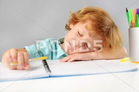 Adorable child sitting indoors Stock Photos