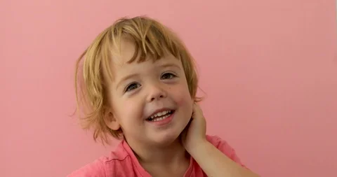 Adorable child smiling at camera Video stock 111757686