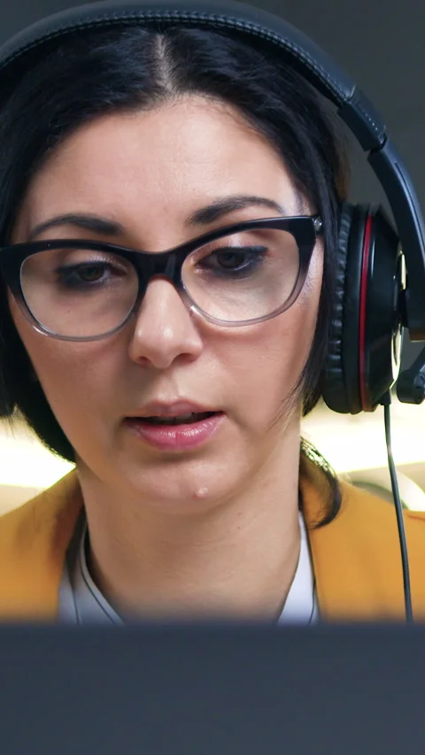 Adorable considerate high-skilled stylish brunette-female office manager in head Stock Footage 332944456