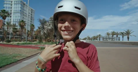 Adorable cute kid learn to ride longboard Stock Footage 231309580