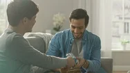 Adorable Gay Boyfriend Gifts A Beautiful Shiny Gift Box To His Cute Hispanic Stock Footage