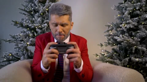 The adorable guy is immersed in a computer game. Video stock 167651015