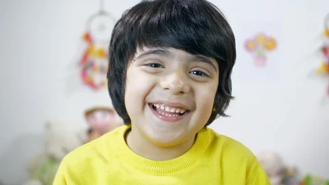 Adorable handsome Indian boy looking int... | Stock Video | Pond5