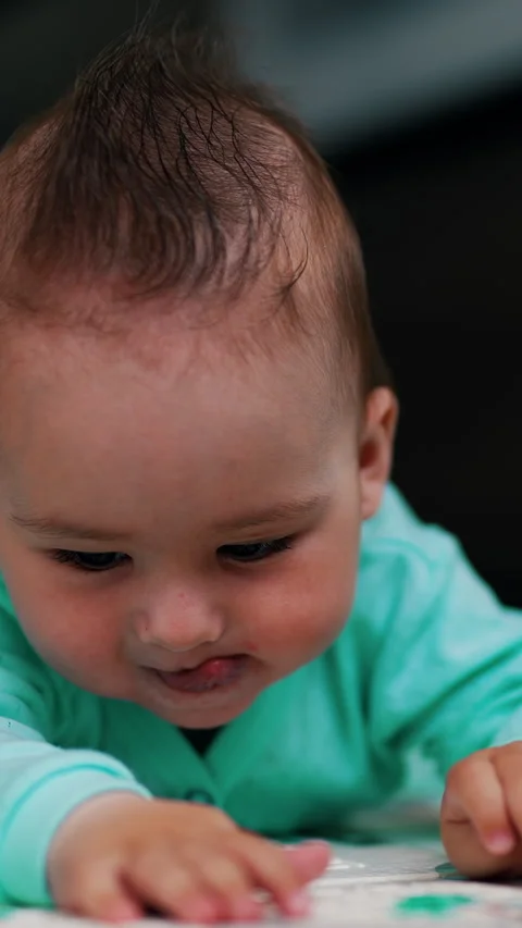 Adorable infant baby with funny hairdo Stock Video Pond5