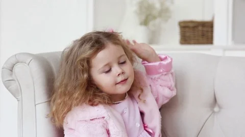 Adorable kid dressing up and styling Stock Footage 83178409