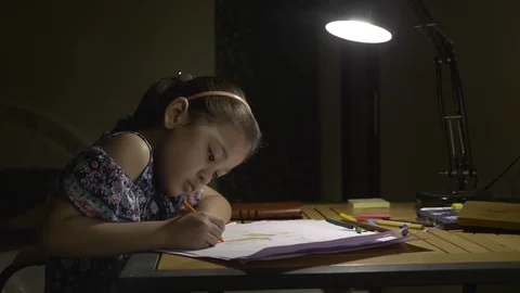 A adorable kid studying in a study room during the exams. Stock Footage 124340364