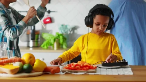 Adorable Small DJ Boy Playing on Child Sound Mixing Machine Making Music Dancing Stock Footage 147271848