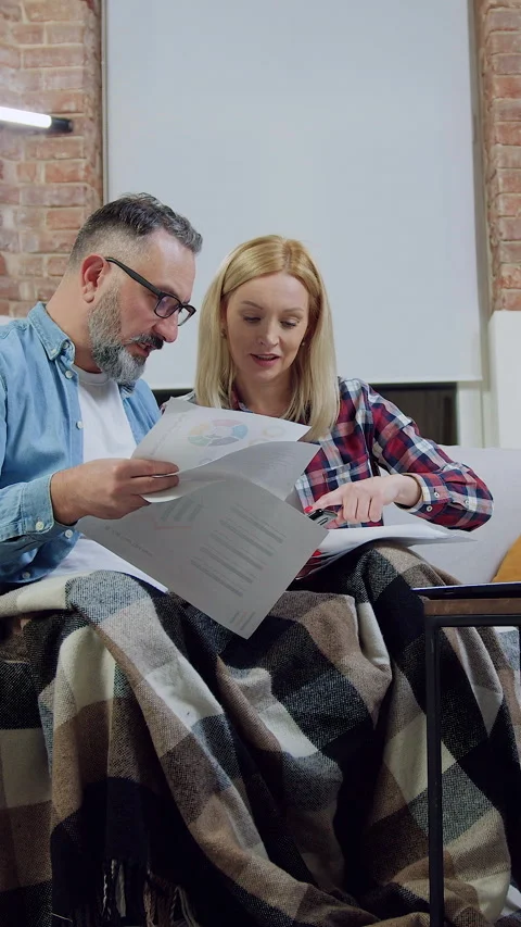 Adorable smiling lucky successful bearded man and his wife getted good news when Stock Footage 331591909